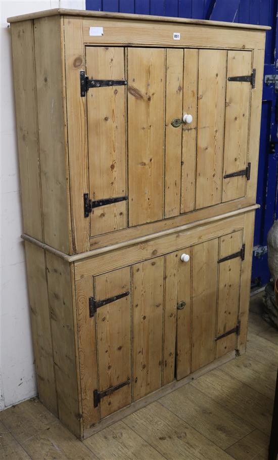 A pine cupboard W.102cm.